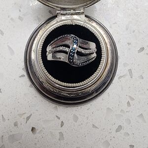Blue diamond and diamond twist ring